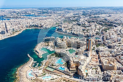 Malta aerial view. Malta from above. Portomaso Business Tower Skyscraper in Paceville district. Stock Photo